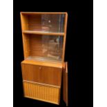 A Mid 20th century Poul Cadovius modular ?Cado? and ?Royal? shelving system consisting of two glazed