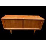 A Danish teak sideboard by Bernhard Pedersen & Son circa 1960s, with tambour front revealing three