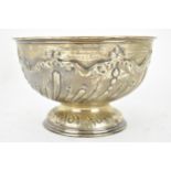 A late Victorian silver presentation bowl by James Deakin & Sons, Sheffield 1896, embossed with