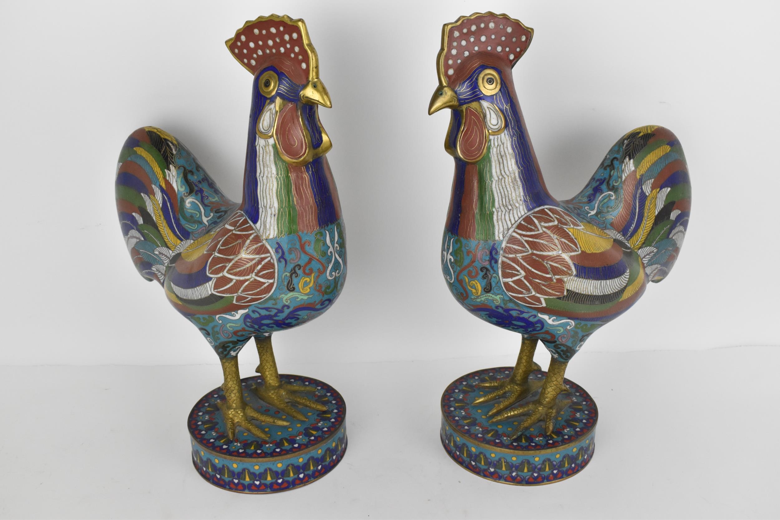 A large pair of Chinese cloisonné enamel cockerels, 43cm h