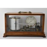 A Walter Wyatt - 'Simplex' barograph Rd No 468791 in a glazed, oak case with a hinged box section,