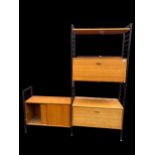 A mid 20th century Staples Ladderax teak room divider consisting of one shelf, three cupboards,