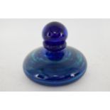 An Isle of Wight glass bottle and stopper by Michael Harris, etched to base, 11cm h. Condition: no