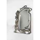 An Art Nouveau pewter dressing table easel back mirror, possibly by WMF with a classical maiden