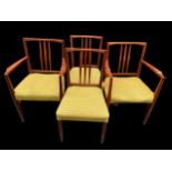 A set of four Gordon Russell 1950s teak dining chairs, model 6409 and 6408, designed by W.H Curly,