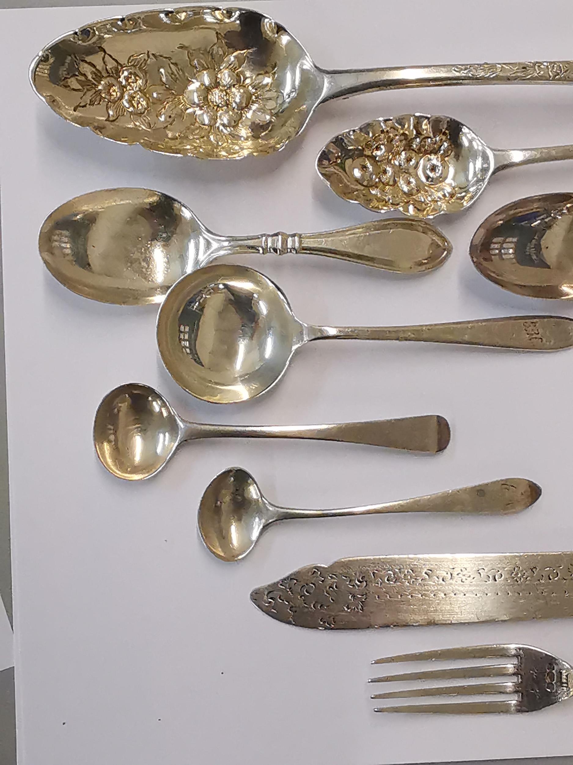 Silver to include two Georgian berry spoons, two Georgian teaspoons, a Victorian teaspoon, a caddy - Image 3 of 3