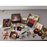 Mixed lot to include a Victorian jewellery box, costume jewellery, two autograph books, cloth