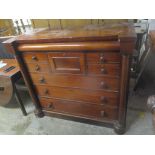 A Victorian mahogany chest of two deep drawers, two short drawers and three long drawers, on a