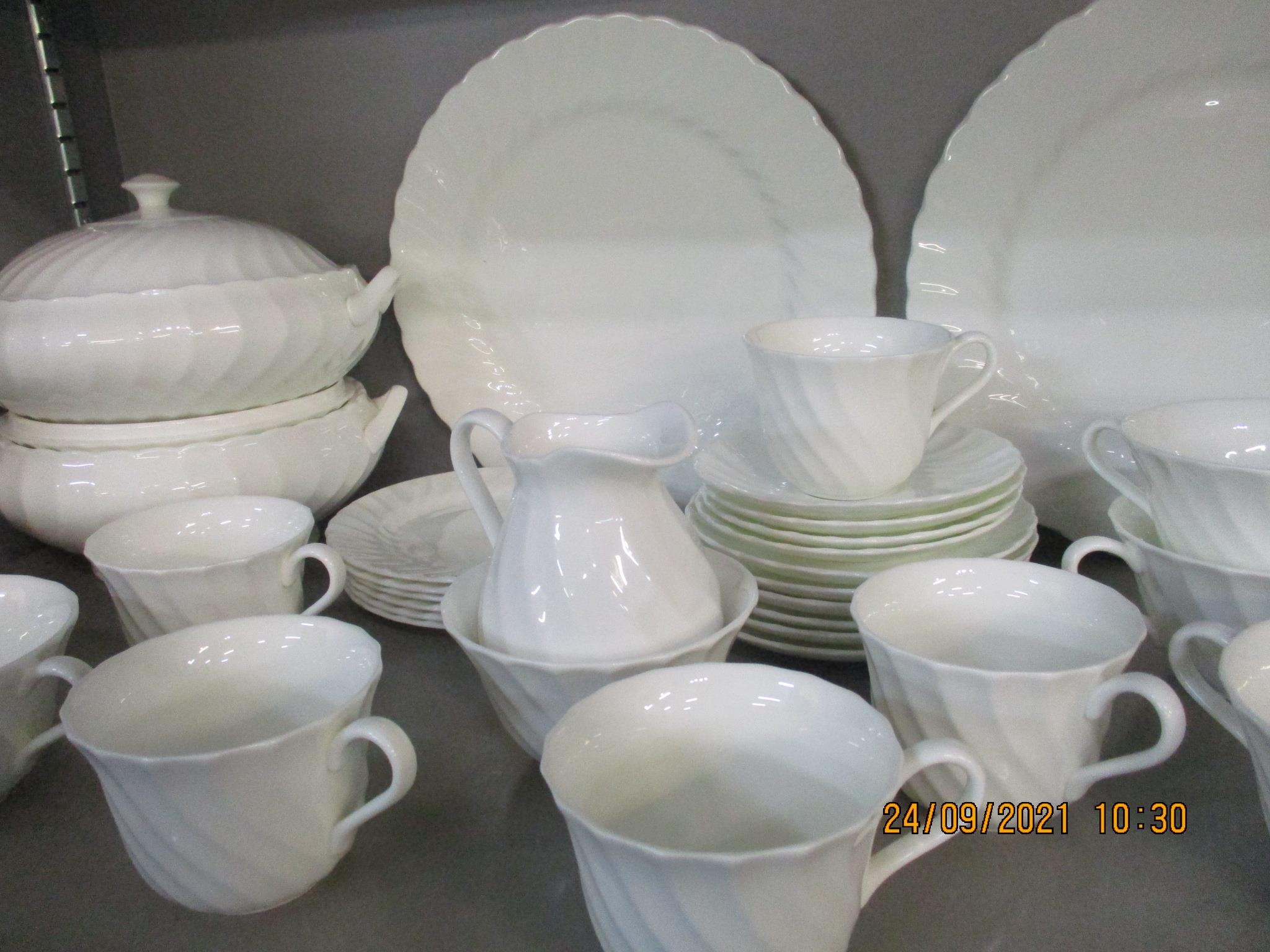 A Wedgwood Candlelight pattern white glazed part dinner service with moulded wrythen decoration, and - Image 3 of 3