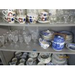 A selection of cut table glass and blue and white ceramics to include Waterford and Thomas Webb