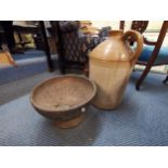 An antique cast iron bowl together with a stoneware flagon Location: SL