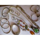 Silver and white metal jewellery to include bracelets, two babies bangles with bell charms, a silver