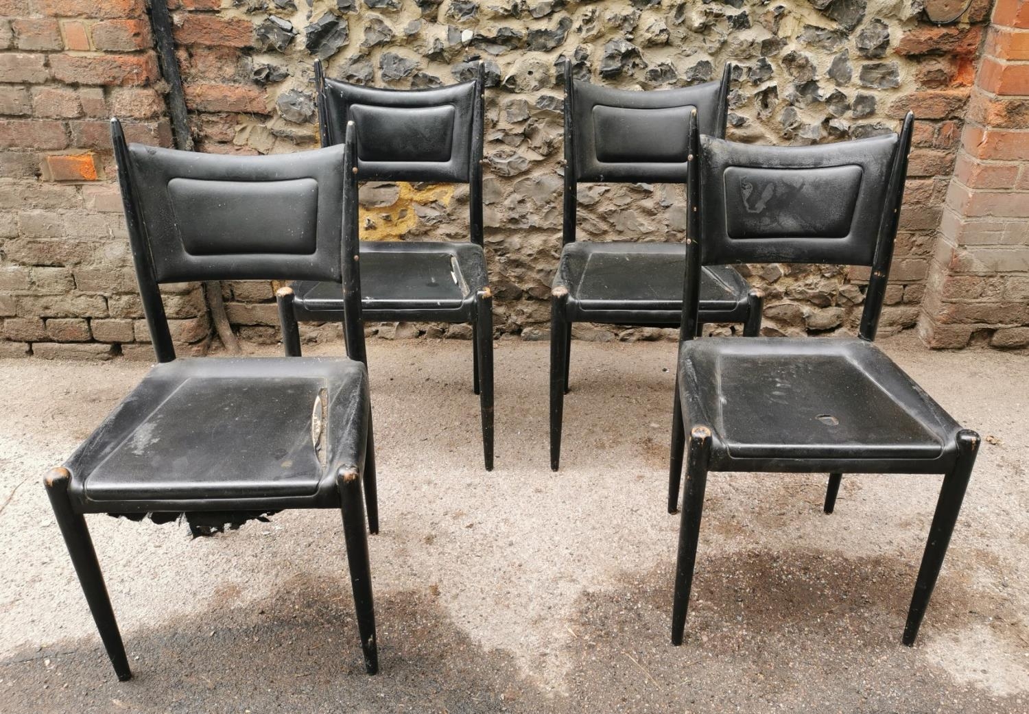 A set of four 1950s G plan E Gomme black vinyl upholstered chairs, model '636' in the Gio Ponti