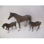 Three Beswick china horses, two smaller examples A/F and larger horse, 29cm high