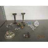 A small group of ornaments to include a miniature four piece teaset on an engraved tray, miniature