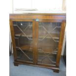 A mid 20th century mahogany display cabinet with twin astragal glazed doors, 107 h x 95 w x 29cm d