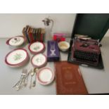 A mixed lot to include Wedgwood crockery, books, a crystal jug with silver plate top, an Olympia