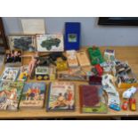 Vintage toys to include a Commando Action Man 34009, early 20th century girls books, a Nitto