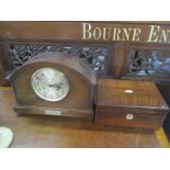 An early 20th century oak eight day mantel click together with a 19th century rosewood and mother of