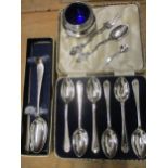A set of six cased silver teaspoons 80.4g, together with a silver christening spoon with 'Nora'