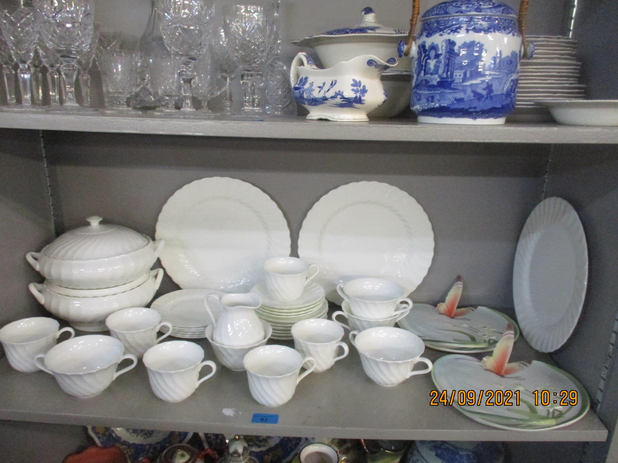 A Wedgwood Candlelight pattern white glazed part dinner service with moulded wrythen decoration, and