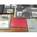 A group of three photograph albums containing various photographs of trains, steam engines and other