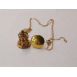 A 9ct gold bell shape pendant on chain together with a 10ct gold dress stud, 3.1g Location: Cab