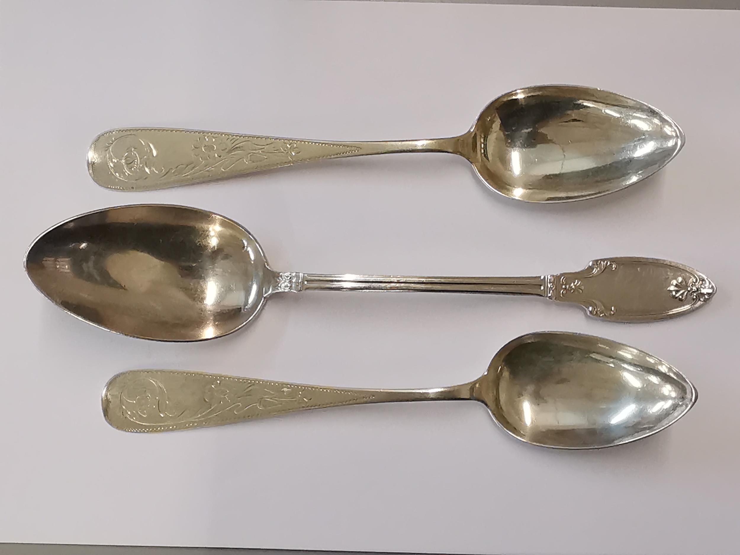 A pair of German silver serving spoons, together with a French silver serving spoon, 207g