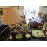 Two porcelain table lamps, one with fabric shade, framed and glazed set of cigarette cards,