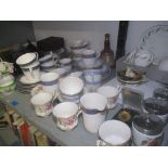 Ceramics to include Poole pottery dolphins, Royal Doulton teaset, Royal Albert teaset, egg