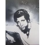 A canvas of singer Tom Jones, inscribed All the best Tom Jones, 50.5cm x 40.5cm