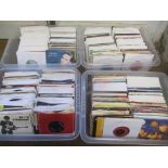 Four crates of assorted 7 inch singles