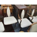 A set of six vintage G-Plan dining chairs, two being carvers, along with three modular bookcases and