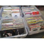 Four crates of assorted 7" singles