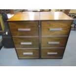 A pair of rosewood veneered filing cabinets with retro style brushed chrome handles, 92cm h x 51cm w