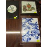 A group of three 20th century Chinese mounted plaques, one in blue and white depicting images of