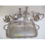 Silver plated items to include a large ornate twin handled tray, a candelabrum and three teapots