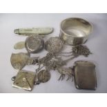 A mixed lot to include a silver vesta case, stamp case, sovereign holder and other items