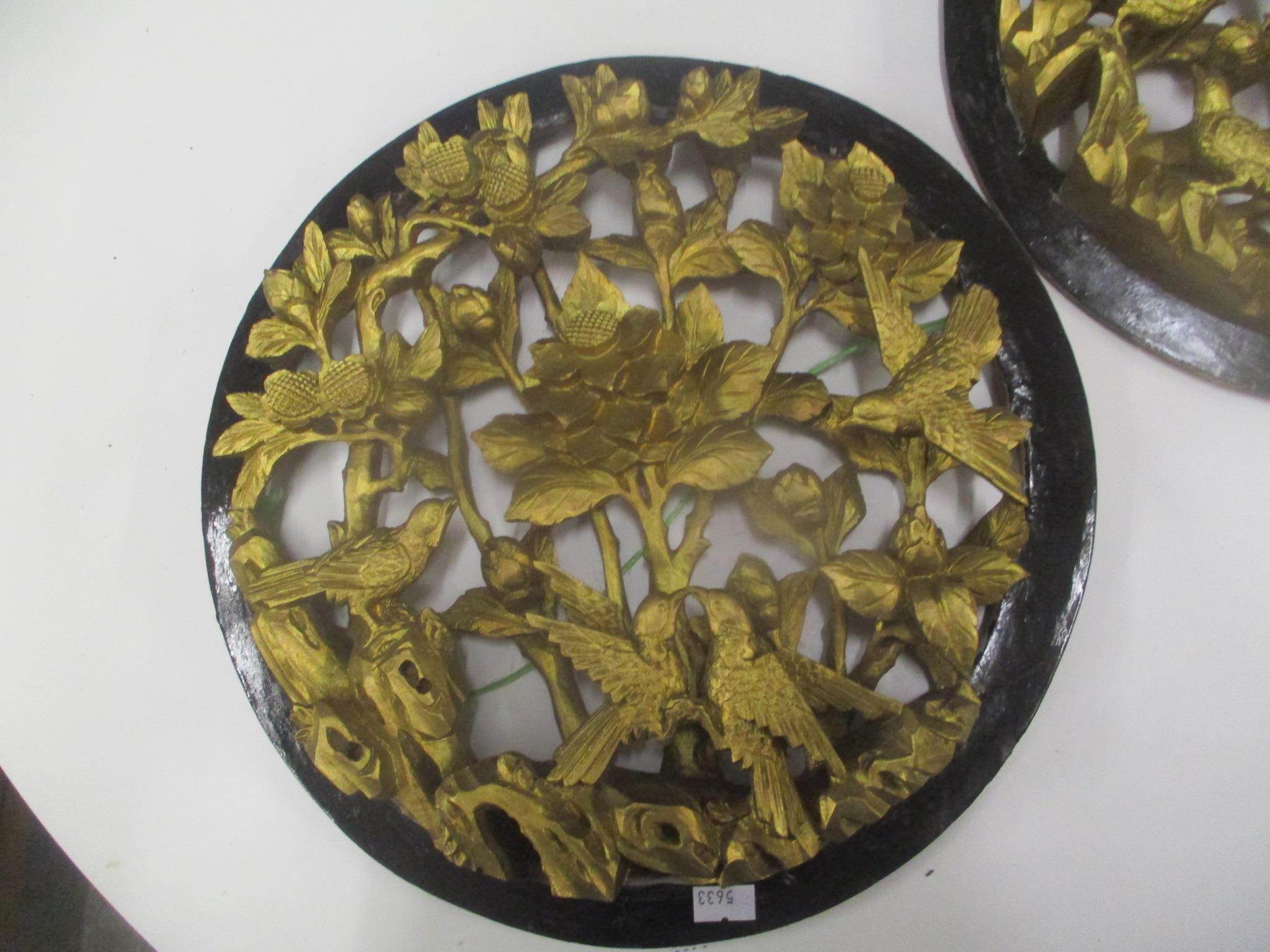 A pair of 20th century Chinese carved gilt and black painted wall plaques 33cm d - Image 3 of 4