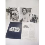 A 1977 Star Wars press campaign book, with original insert and three black and white stills
