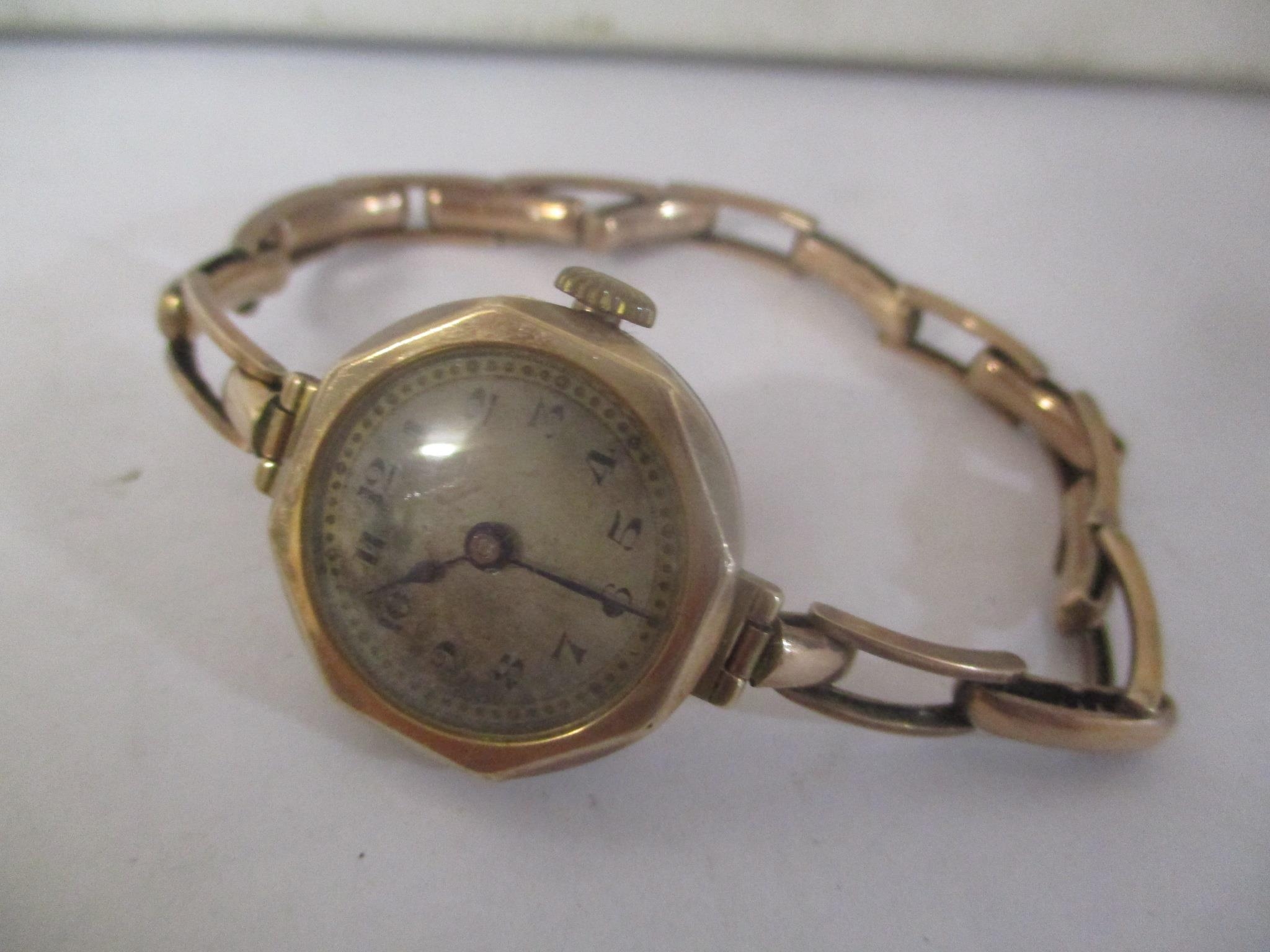 An early 20th century 9ct gold ladies wristwatch on a 9ct gold expanding bracelet 22.6g