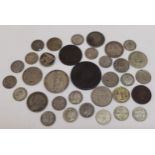A collection of 18th/19th century British coinage to include a George II 1754 half penny, George III