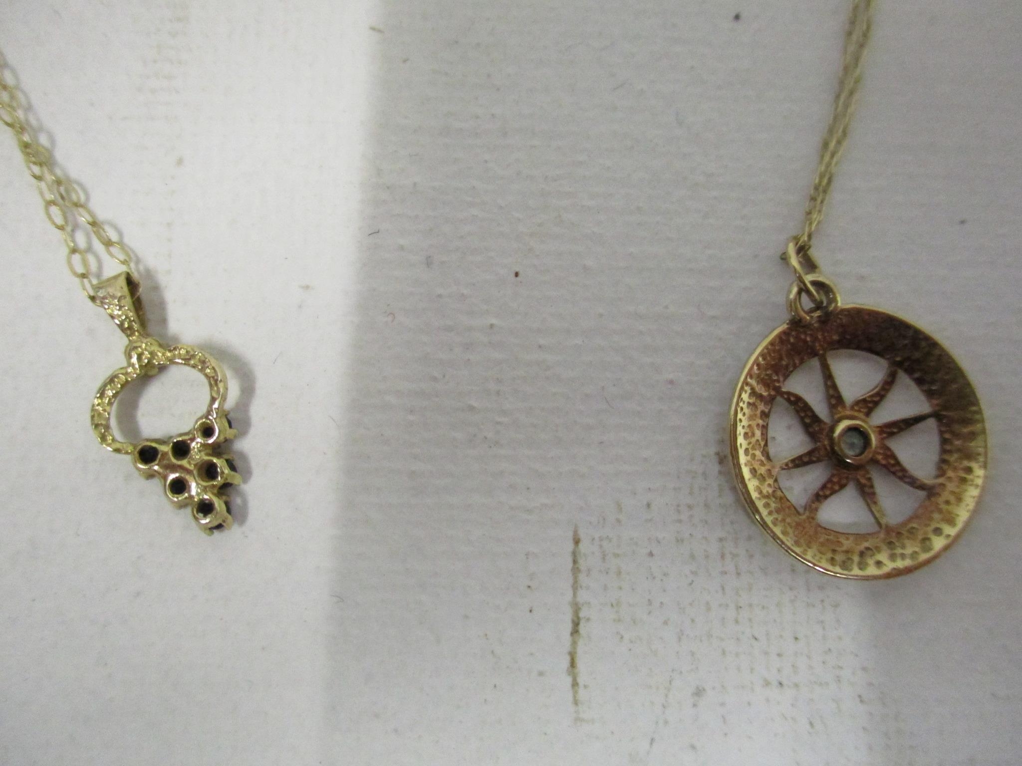 Two gold pendants (unmarked but both test as 9ct), one set with a central aquamarine, the other - Image 3 of 3
