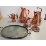 Copperware to include two flagons, watering can, a lid by Benham & Sons, hot water pot and a large