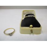 An 18ct yellow gold three-stone diamond ring 2.45g total weight, in a Keystone Elgin ring box, and