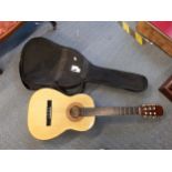 A Hohner child's acoustic guitar with travel case Location: CF