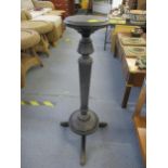 An early 20th century ebonized plant stand Location: C