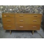 A mid 20th century retro stag Concorde light oak chest of drawers by John & Sylvia Reed having three