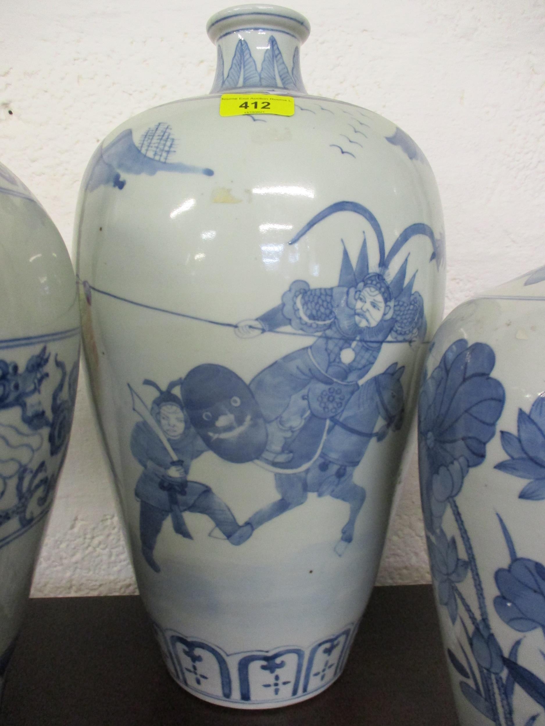 A group of three 20th century Chinese blue and white vases in varying sizes and colours, the tallest - Image 2 of 9