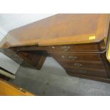 A large reproduction mixed veneer twin pedestal desk having a burr elm top and three drawers above